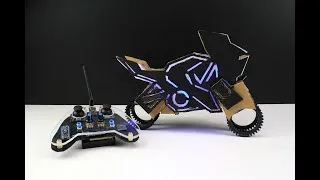 Miniature : Comment construire une moto en carton à roue sans rayon.