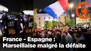 Miniature : Marseillaise et évacuation par la police des supporters après la défaite de la France en demi finale