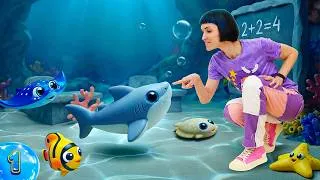 Miniature : Le petit requin Sharky va à l'école et fait connaissance à ses amis, les habitants marains.
