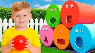 Miniature : Les enfants nourrissent les tubes colorés!
