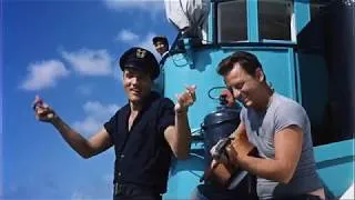 Miniature : Elvis Presley dans Girls! Girls! Girls! avec une Rolex big Crown 6538
