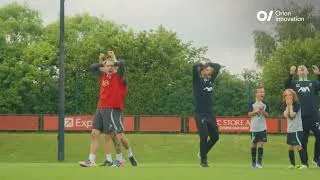 Miniature : Luiz Dias avec les joueurs de l'académie