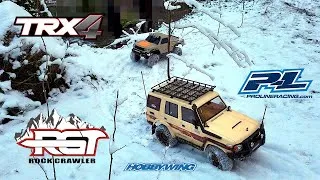 Miniature : RGT ex86190 | FTX Outback Tracker Land cruiser 76 and Traxxas TRX 4 Sport on snowy trails