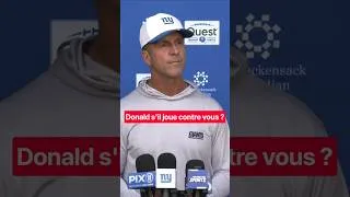 Miniature : John Harbaugh sur Aaron Donald