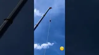 Miniature : Crowd Panics as Man Climbs Crane 😱 #ViralShorts #CaughtOnCamera #CraneClimb
