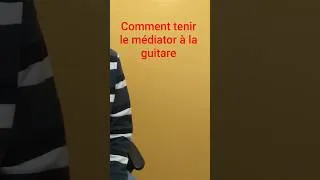 Miniature : Comment tenir le médiator pour jouer de la guitare